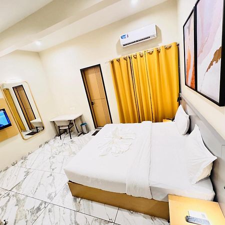 Ixoras Hotel Lemba Kinshasa Buitenkant foto