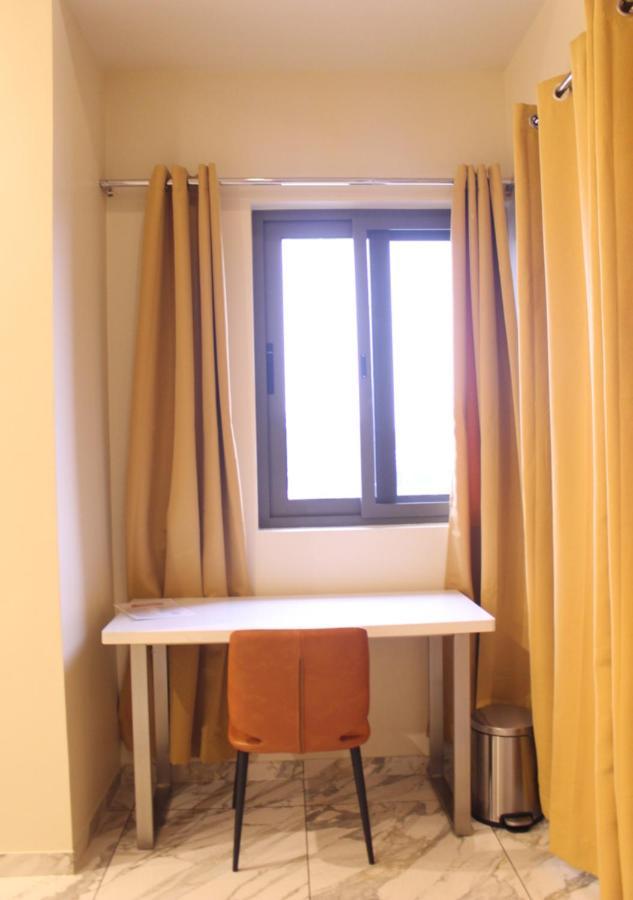 Ixoras Hotel Lemba Kinshasa Buitenkant foto