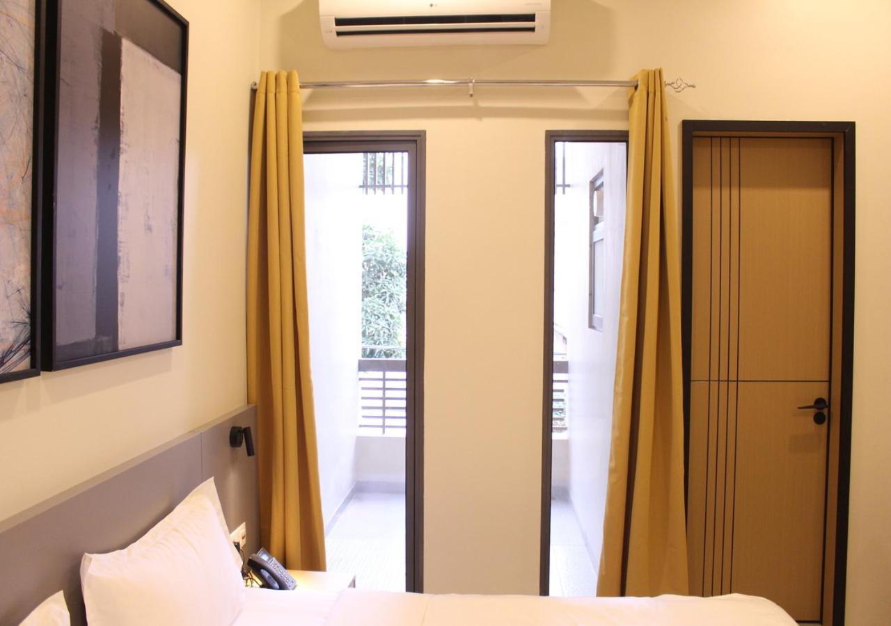 Ixoras Hotel Lemba Kinshasa Buitenkant foto