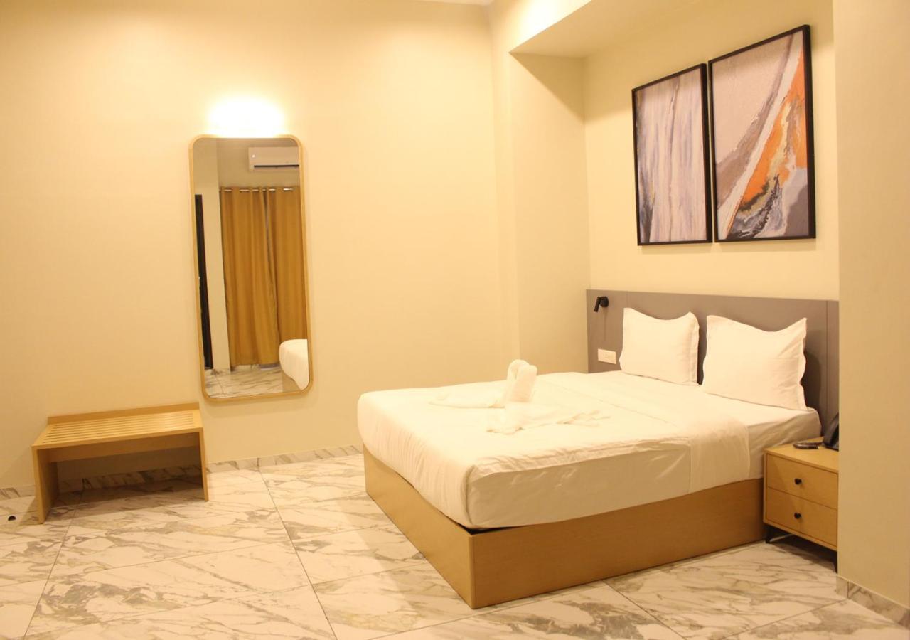 Ixoras Hotel Lemba Kinshasa Buitenkant foto